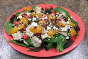 Natalie's salad with chicken, oranges, walnuts and strawberry vinaigrette.